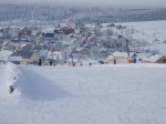 Bozi Dar - skigebied Neklid - utzicht richtng het dorp en skigebied Novako